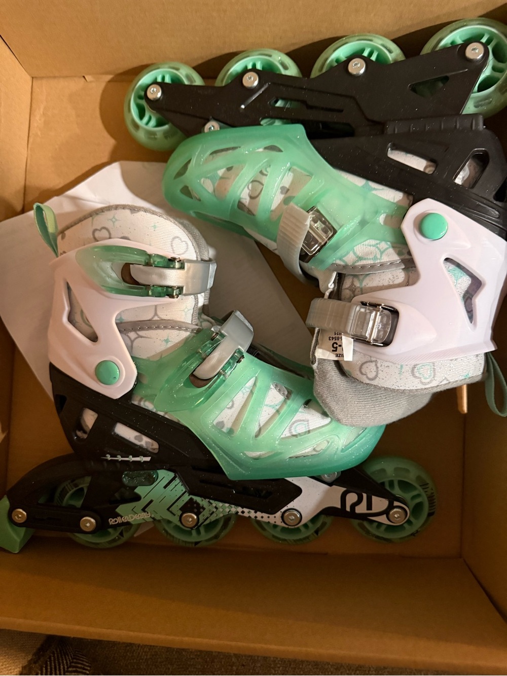 Girls Rollerblades Adjustable Kids Sz 2-5 by Roller Derby Tracer Model - used 1x